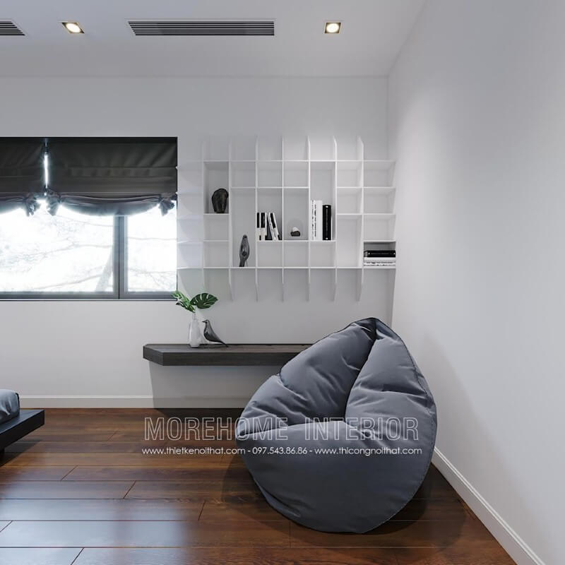 Ghế lười êm ái với kiểu dáng độc đáo cho không gian đọc sách trong phòng ngủ hiện đại. Thiết kế phòng ngủ biệt thự