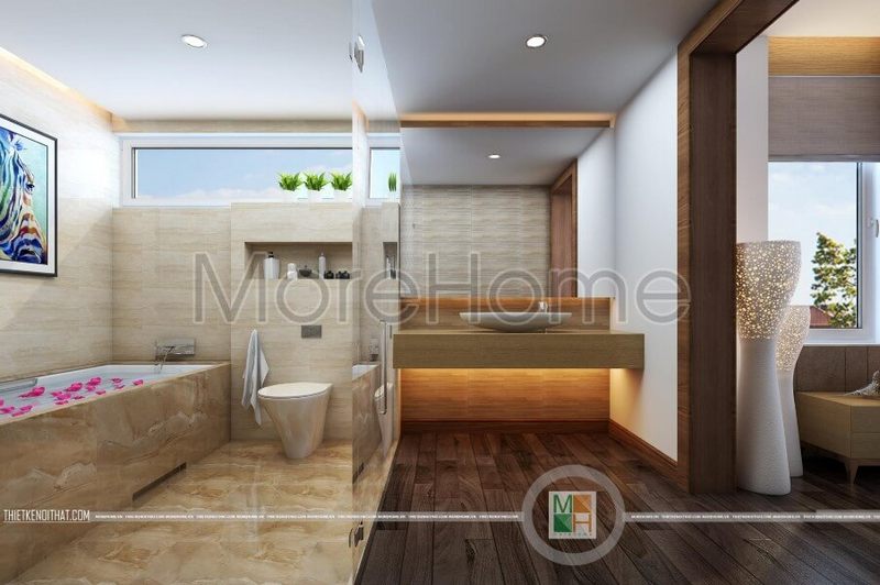 Bồn tắm được thiết kế đẹp với ốp đá mặt lưng và sàn, mang lại sự nhẹ nhàng và tiện nghi cho phòng tắm.